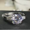 Round Three Stone Engagement Ring
